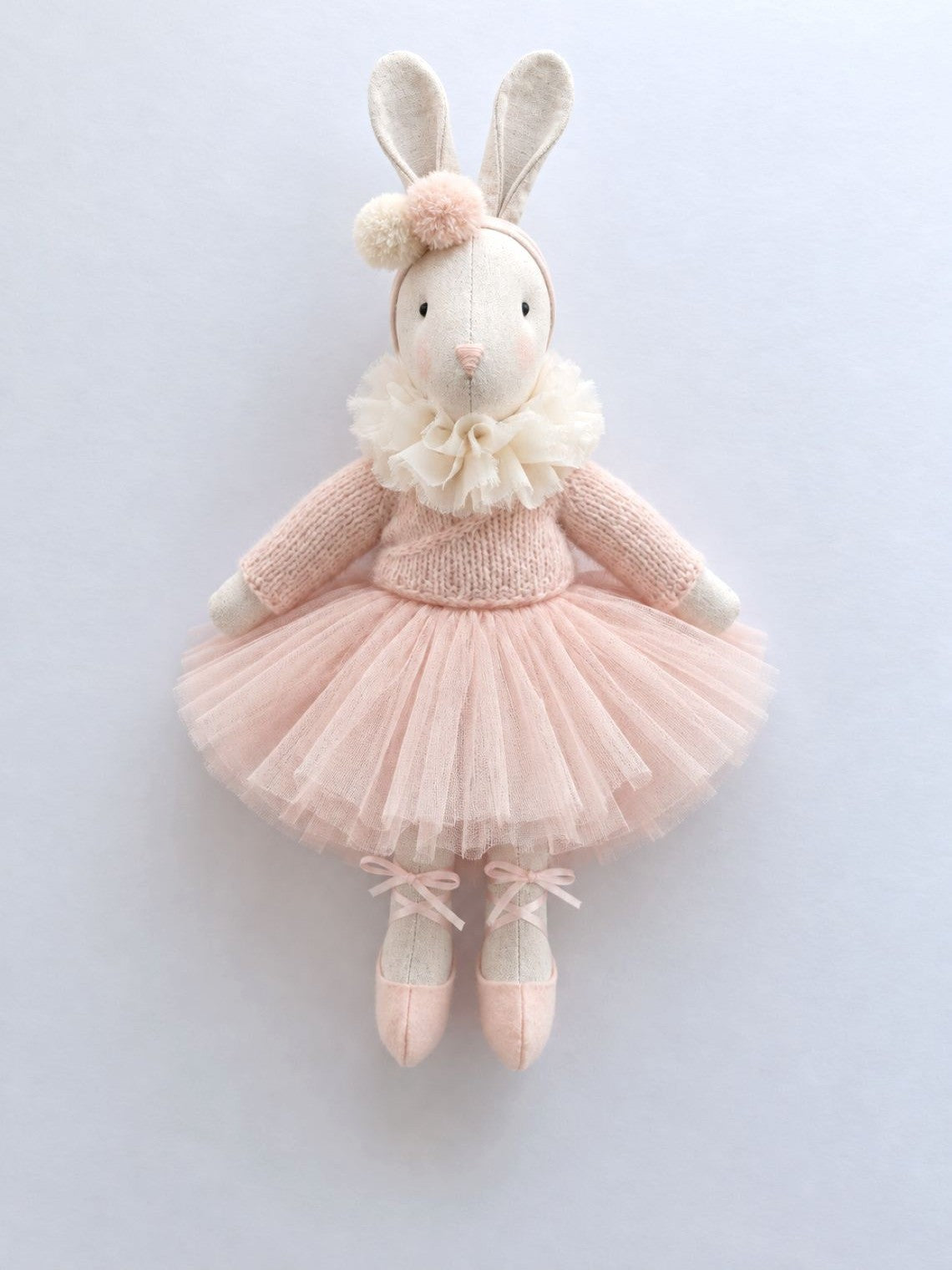 Full-length handmade linen Ballerina Bunny wearing a pink tulle tutu, cardigan and ribbon-tied ballet shoes.