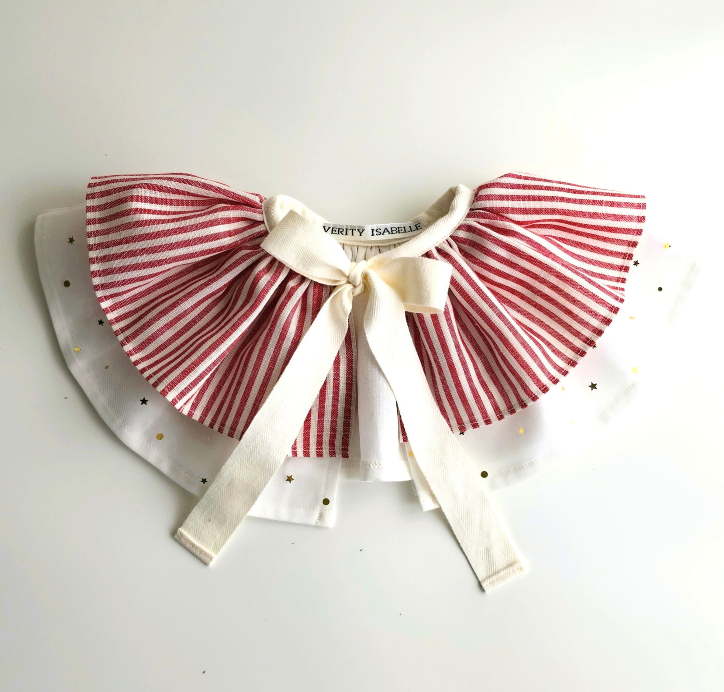 Handmade girls circus cape in red stripe fabric with ivory bow and starry tulle overlay