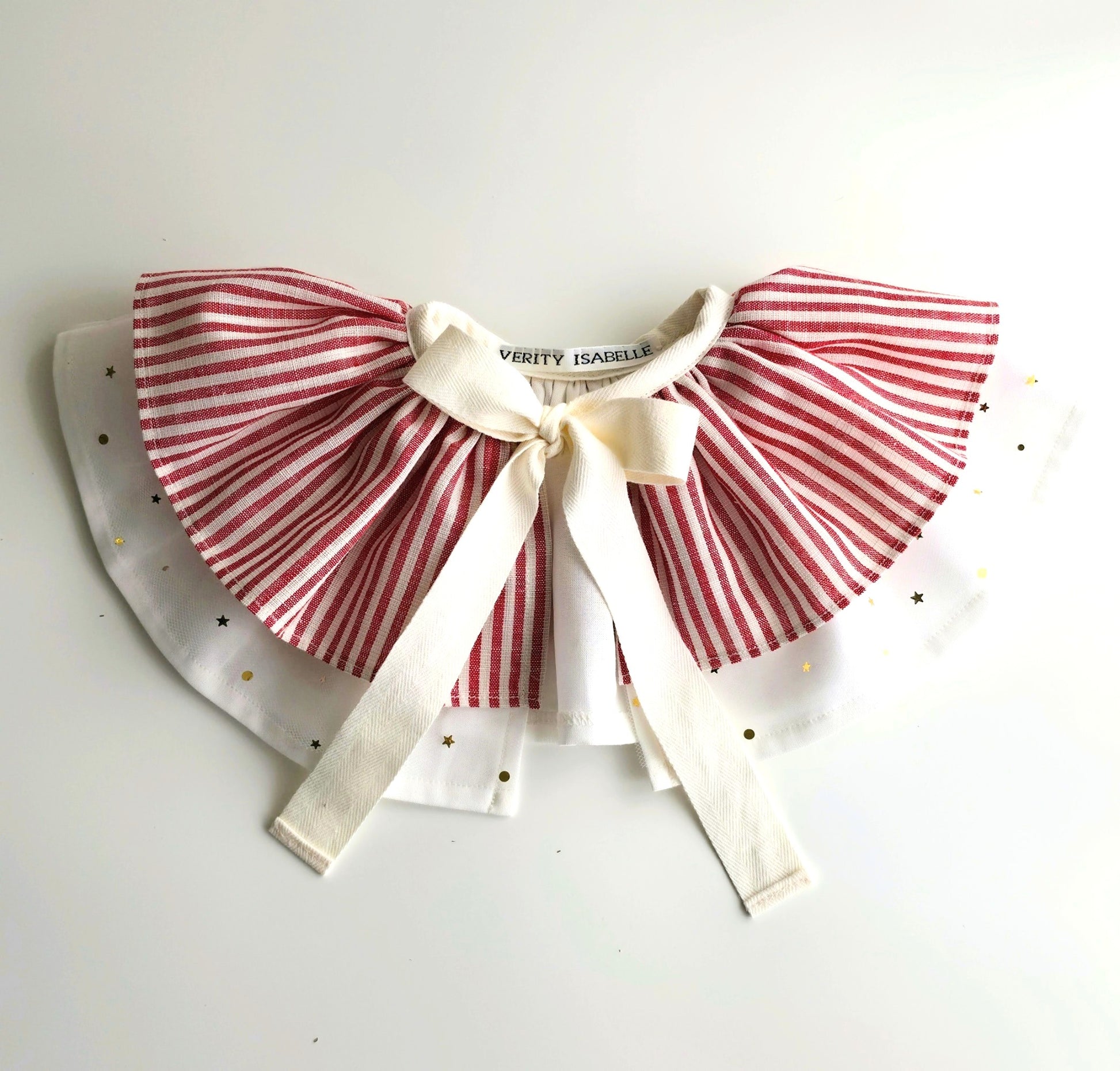 Handmade girls circus cape in red stripe fabric with ivory bow and starry tulle overlay