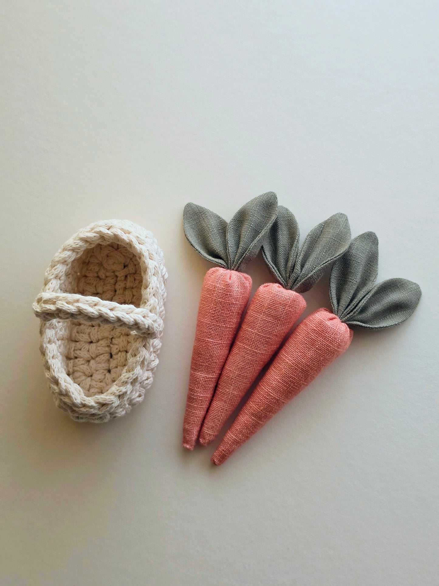 Set of three handmade linen carrots with fabric leaves and a small crocheted basket for pretend play