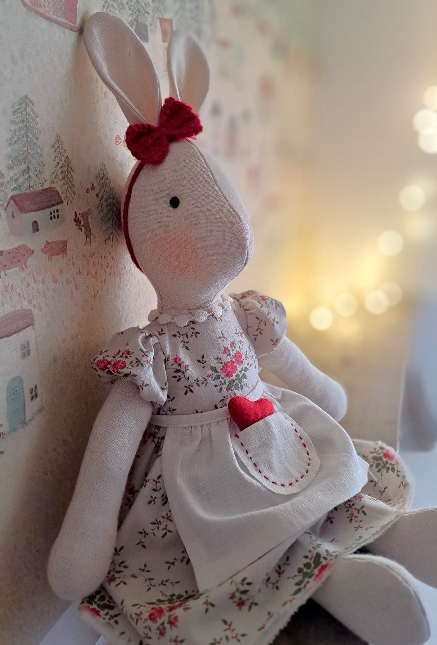 Valentine’s Veronica Bunny handmade as an heirloom gift, featuring a floral dress, linen apron and red felt heart detail