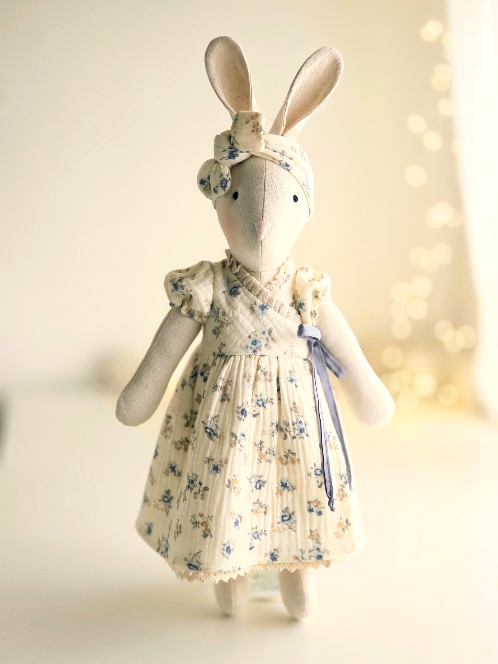 Handmade Veronica Bunny in blue ditsy floral wrap dress with silk ribbon tie, heirloom soft toy