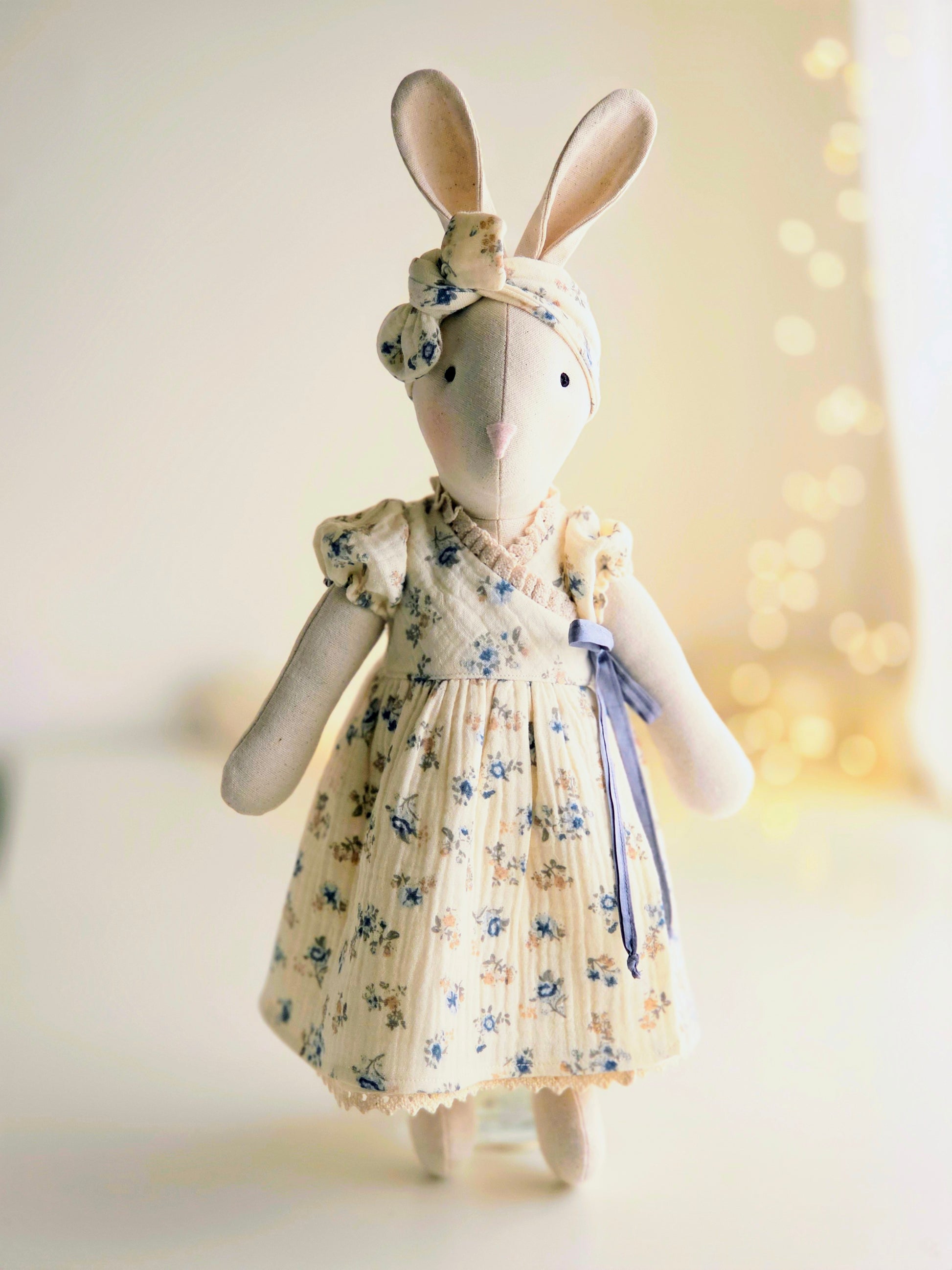 Handmade Veronica Bunny in blue ditsy floral wrap dress with silk ribbon tie, heirloom soft toy