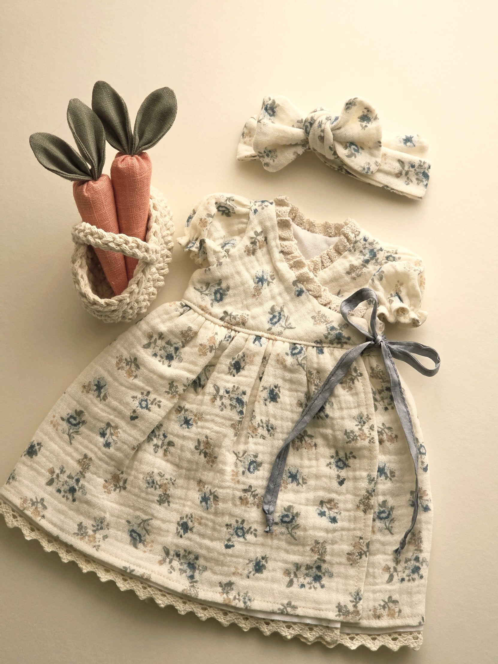 Blue floral gauze bunny dress with silk ribbon tie, matching headband and linen carrot basket accessory