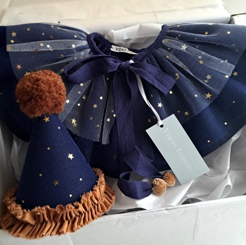 Midnight navy linen cape with double layers of gold star tulle and soft cotton herringbone ties, designed for children’s dress-up or Halloween magic.